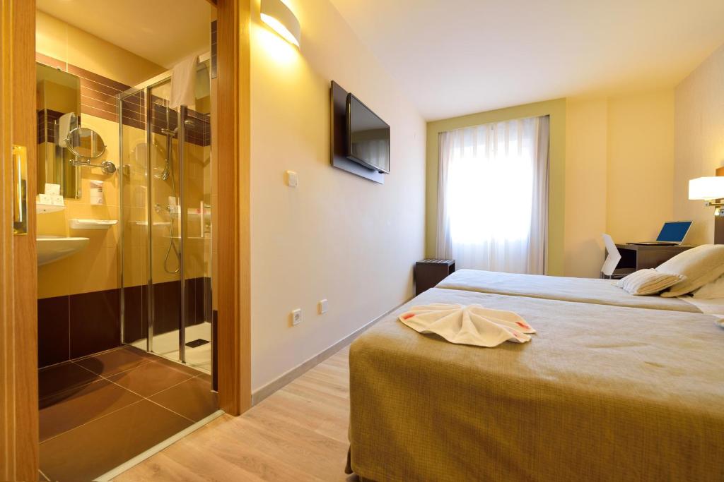 Cama o camas de una habitación en Hotel Spa Norat O Grove 3* Superior