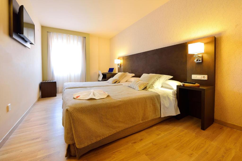 Cama o camas de una habitación en Hotel Spa Norat O Grove 3* Superior
