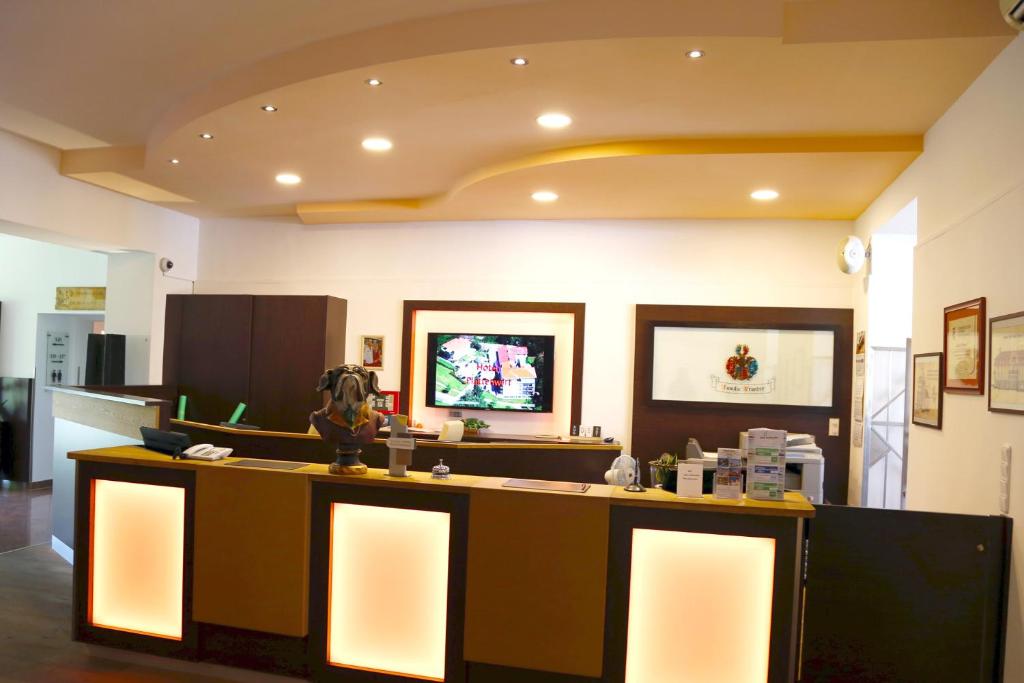 TV a/nebo společenská místnost v ubytování Hotel Plattenwirt