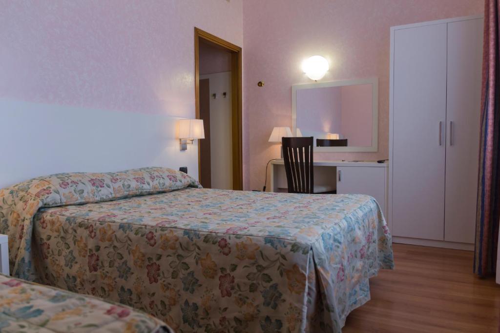 Letto o letti in una camera di Hotel Pico