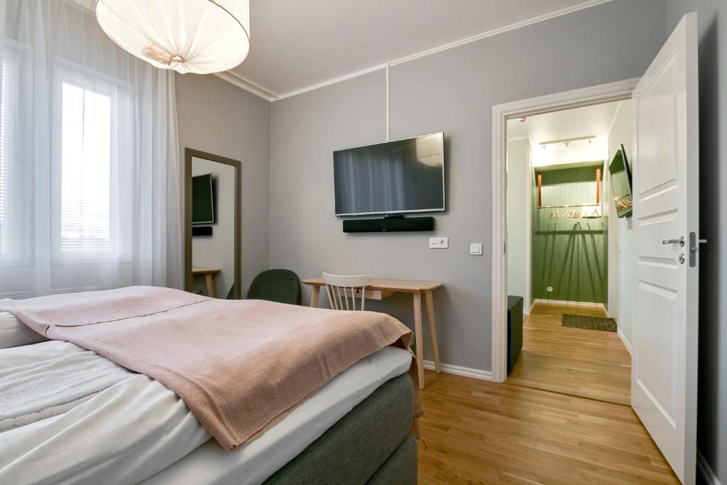 Postel nebo postele na pokoji v ubytování Turinge Hotel