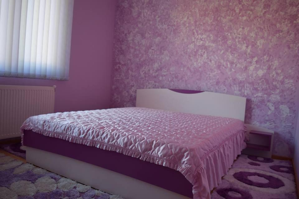 Postel nebo postele na pokoji v ubytování Guest Rooms Profirov