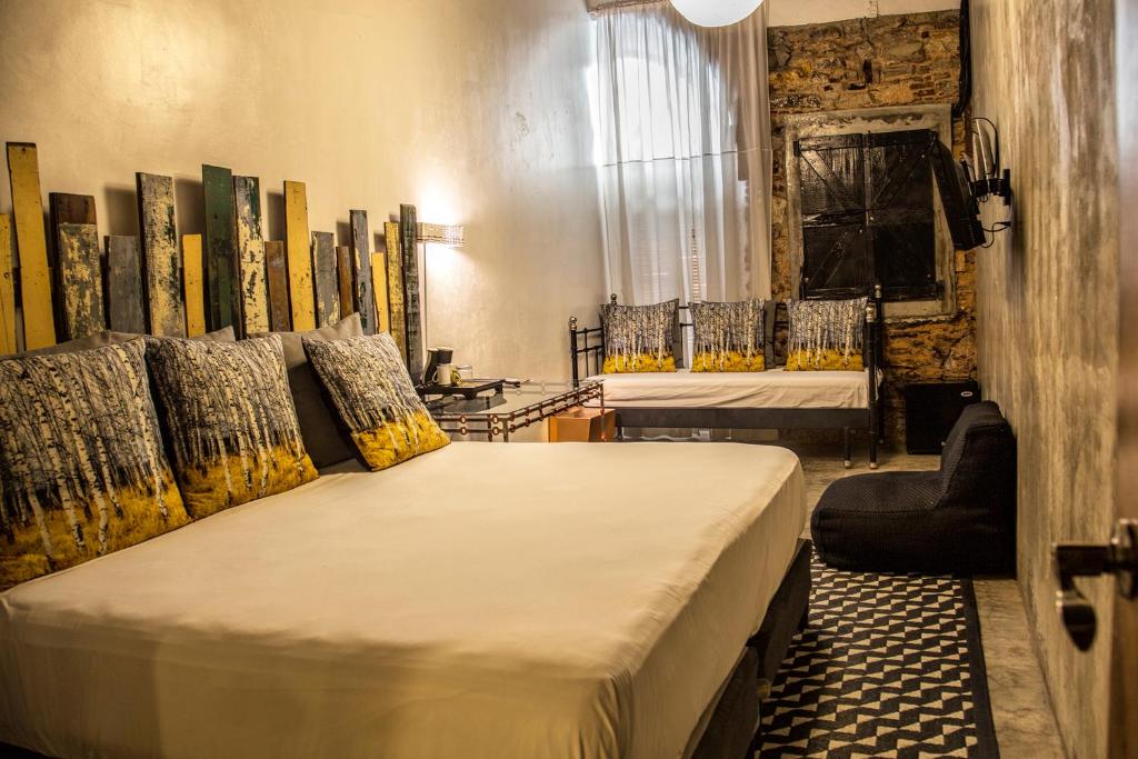 Postel nebo postele na pokoji v ubytování Hotel Casa Panama