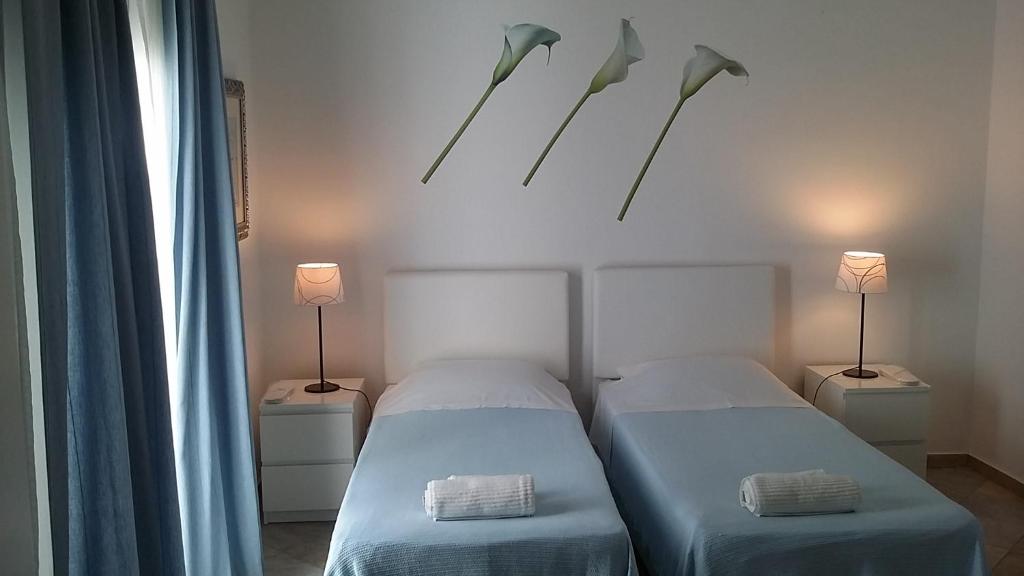 Cama ou camas em um quarto em Lino Apartments