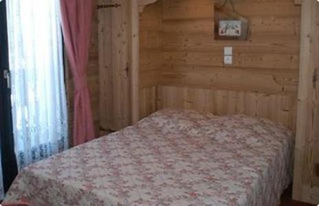 Postel nebo postele na pokoji v ubytování Chalet Fleur des Alpes