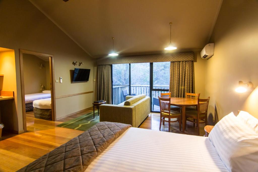 Postel nebo postele na pokoji v ubytování Freycinet Lodge