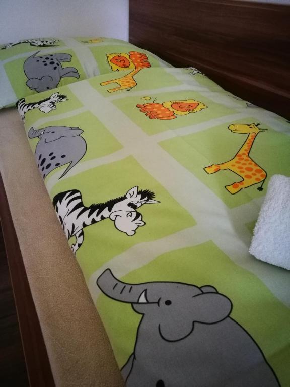 Postel nebo postele na pokoji v ubytování Villa Gold