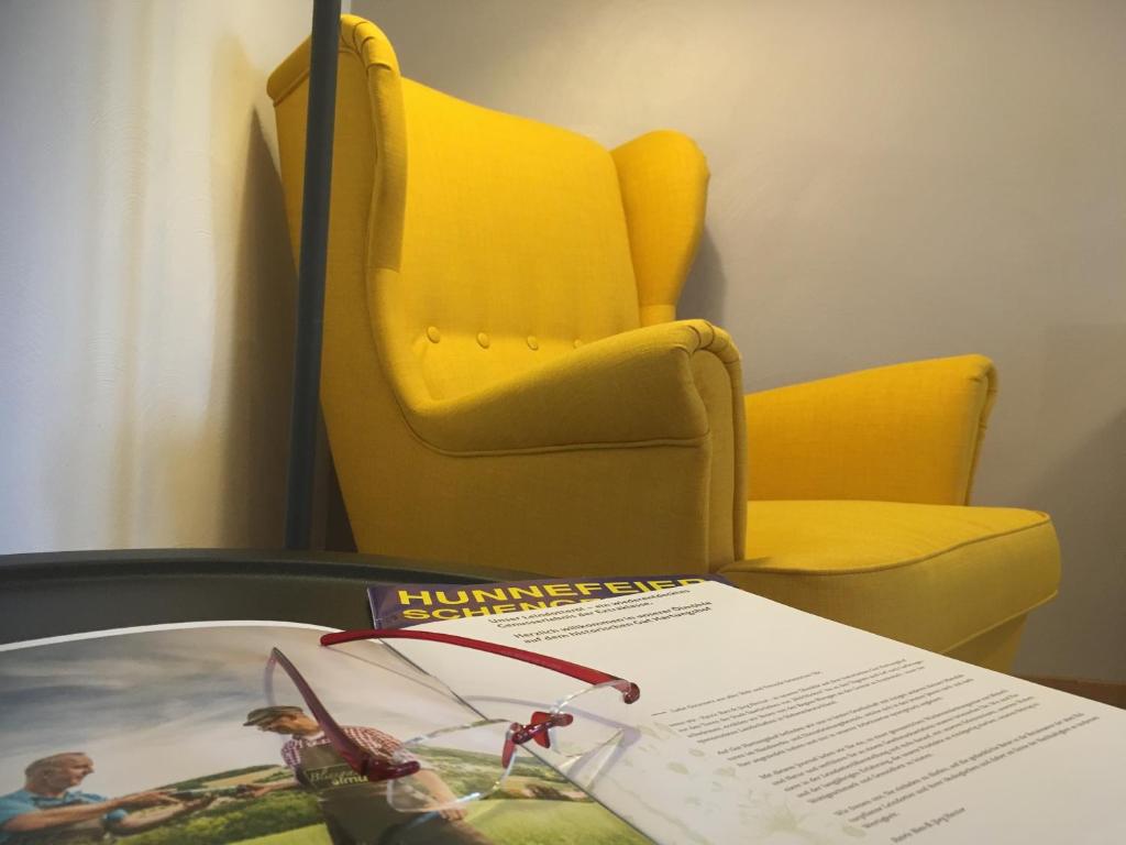 Posezení v ubytování Wein Erlebnis Hotel Maimühle