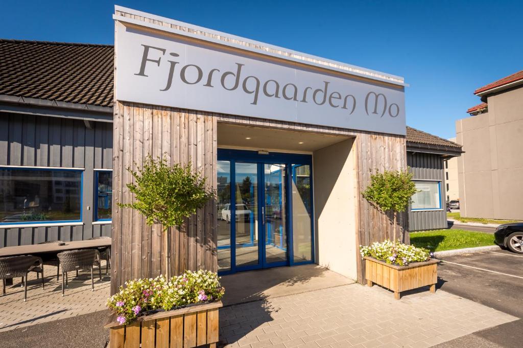 a front of a store with a sign on it at Fjordgaarden Mo in Mo i Rana