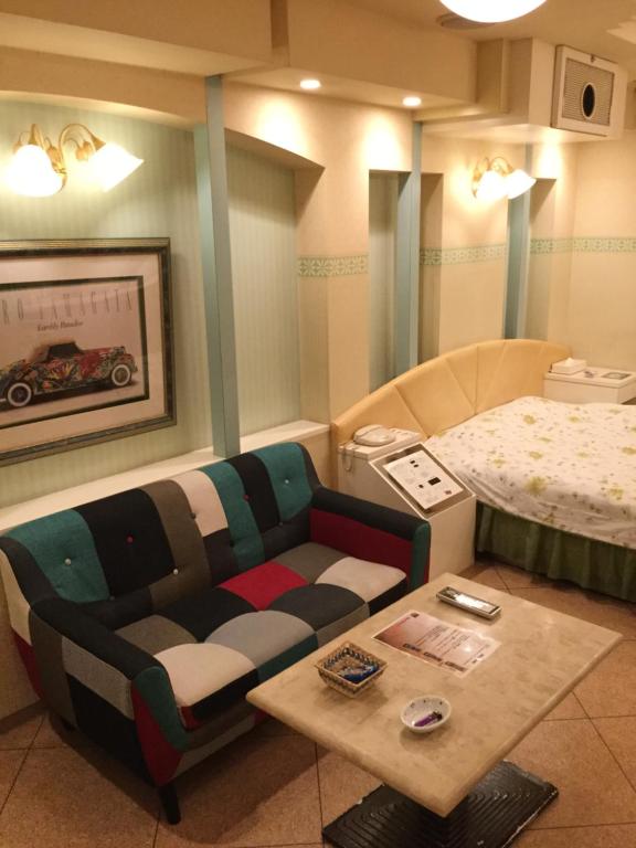 Postel nebo postele na pokoji v ubytování Hotel Charbon (Adult Only)