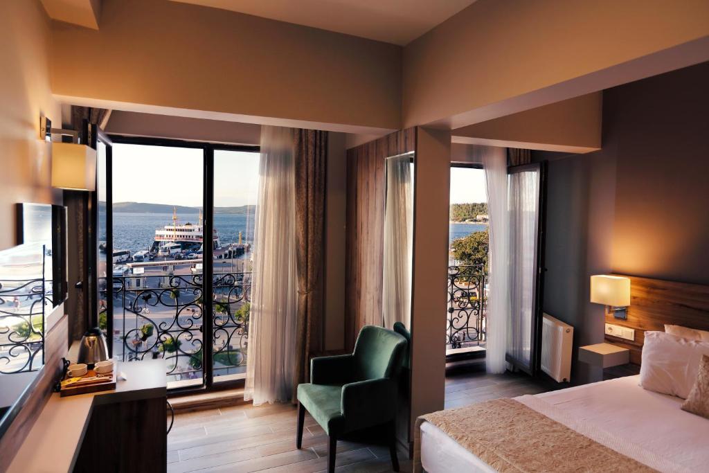Postel nebo postele na pokoji v ubytování Kule Hotel