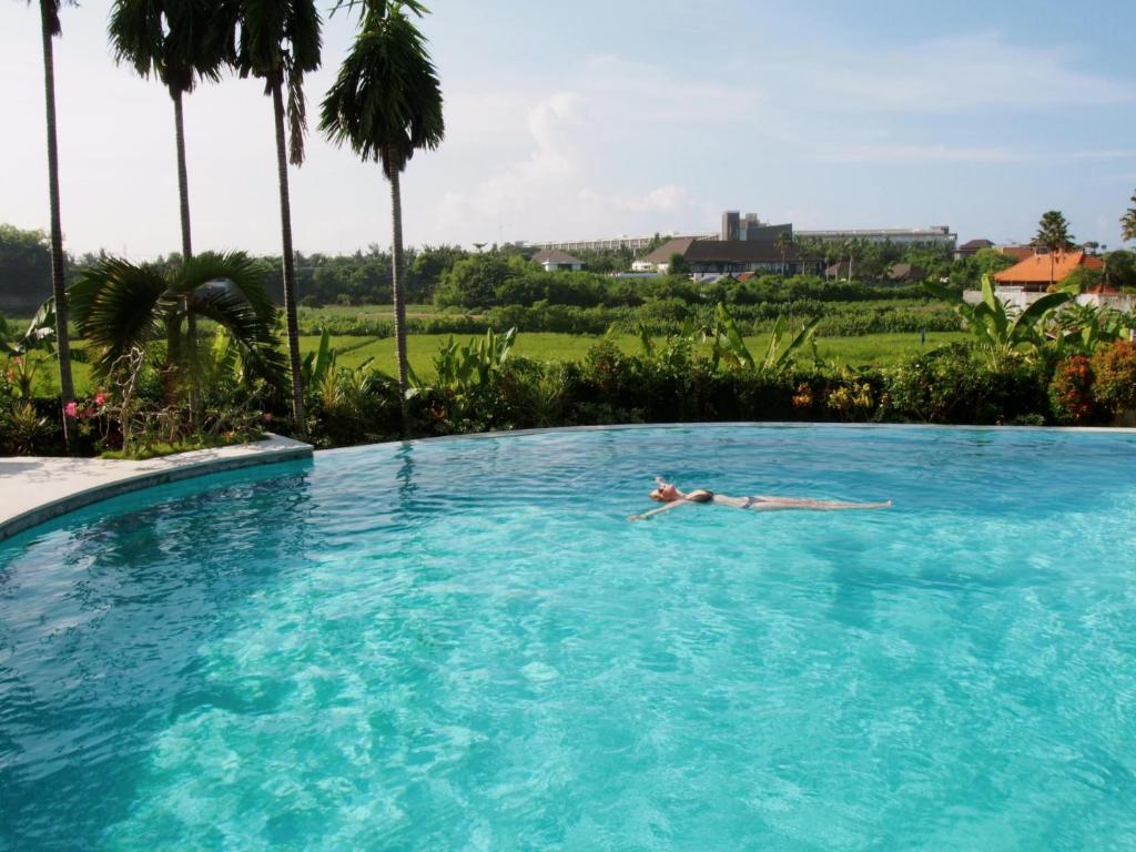 Bazén v ubytování Nipuri Resort and Villas Seminyak by Kamara nebo v jeho okolí