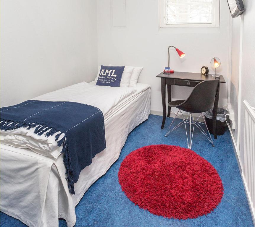 Postel nebo postele na pokoji v ubytování Alsterbro Minihotell