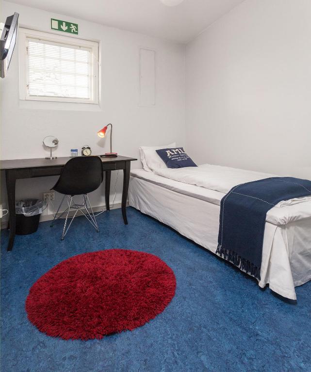 Postel nebo postele na pokoji v ubytování Alsterbro Minihotell