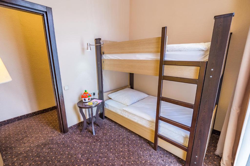 Postel nebo postele na pokoji v ubytování Hotel Lomsia
