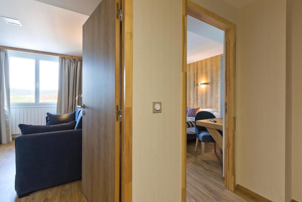 Posezení v ubytování Hôtel restaurant Spa de l'Abbaye