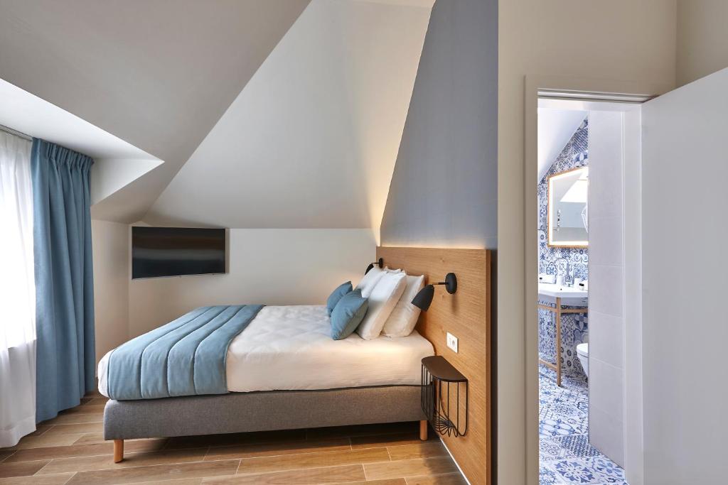 Postel nebo postele na pokoji v ubytování Hygge Hotel