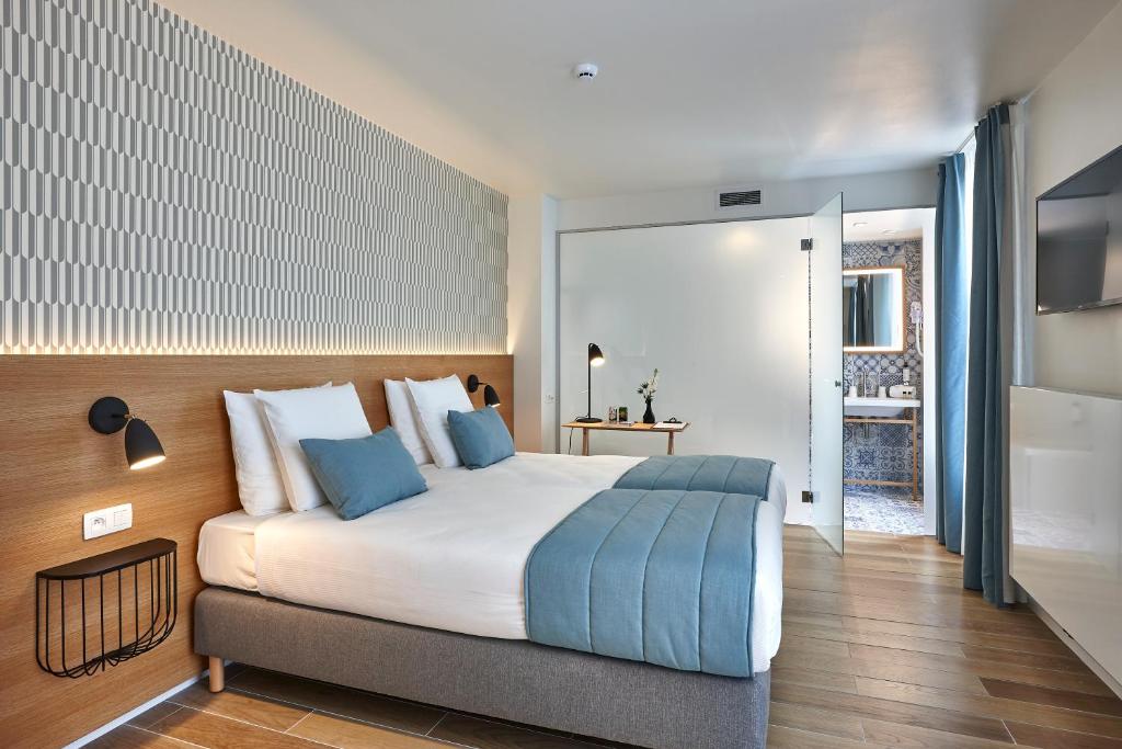 Postel nebo postele na pokoji v ubytování Hygge Hotel