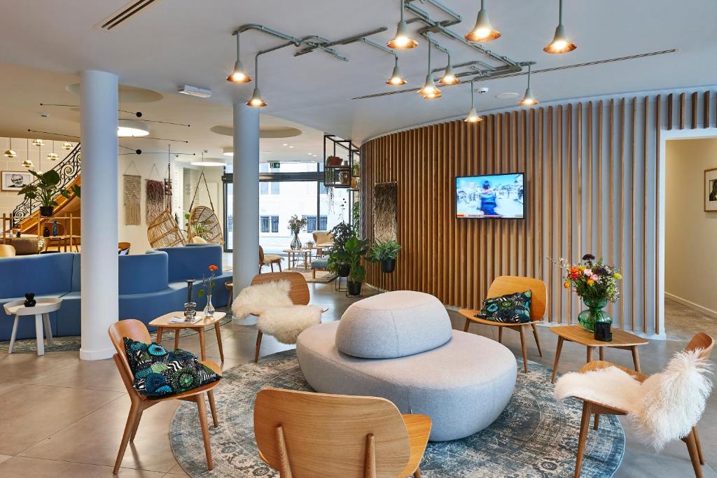 TV a/nebo společenská místnost v ubytování Hygge Hotel