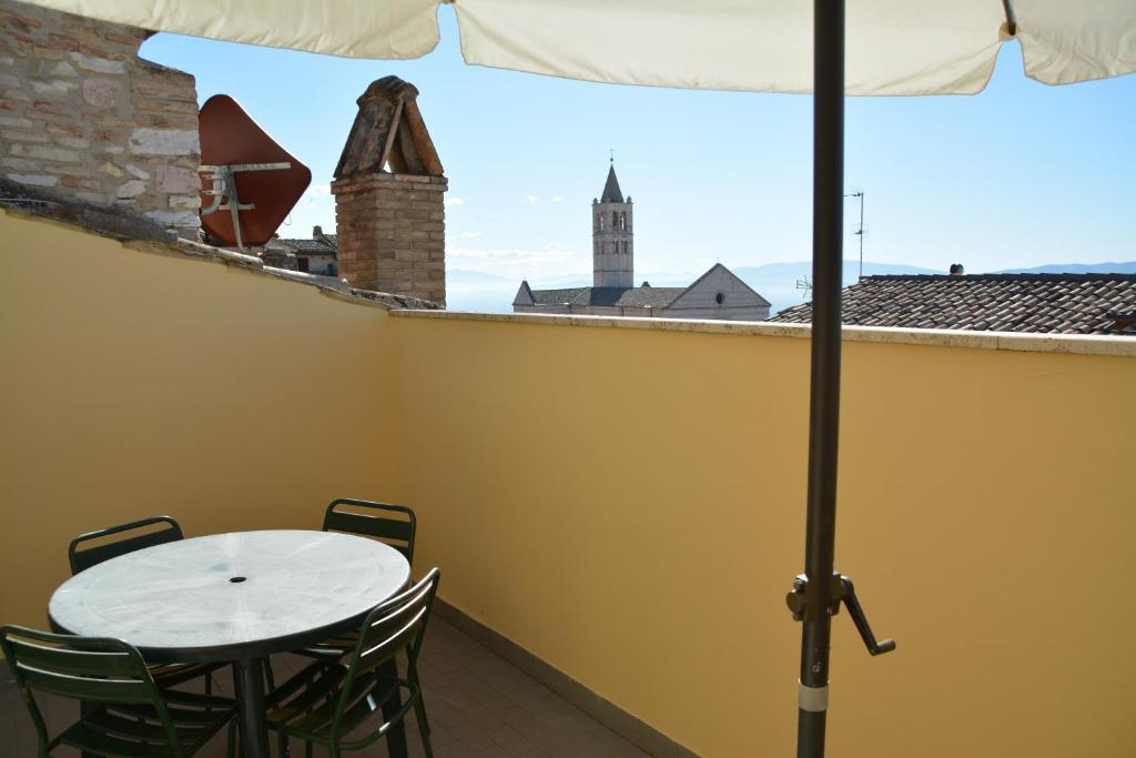 Balkón nebo terasa v ubytování Palazzo Calocci appartamenti in Assisi