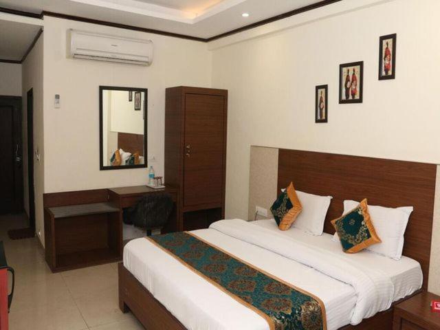 Hotel Vikrant 객실 침대