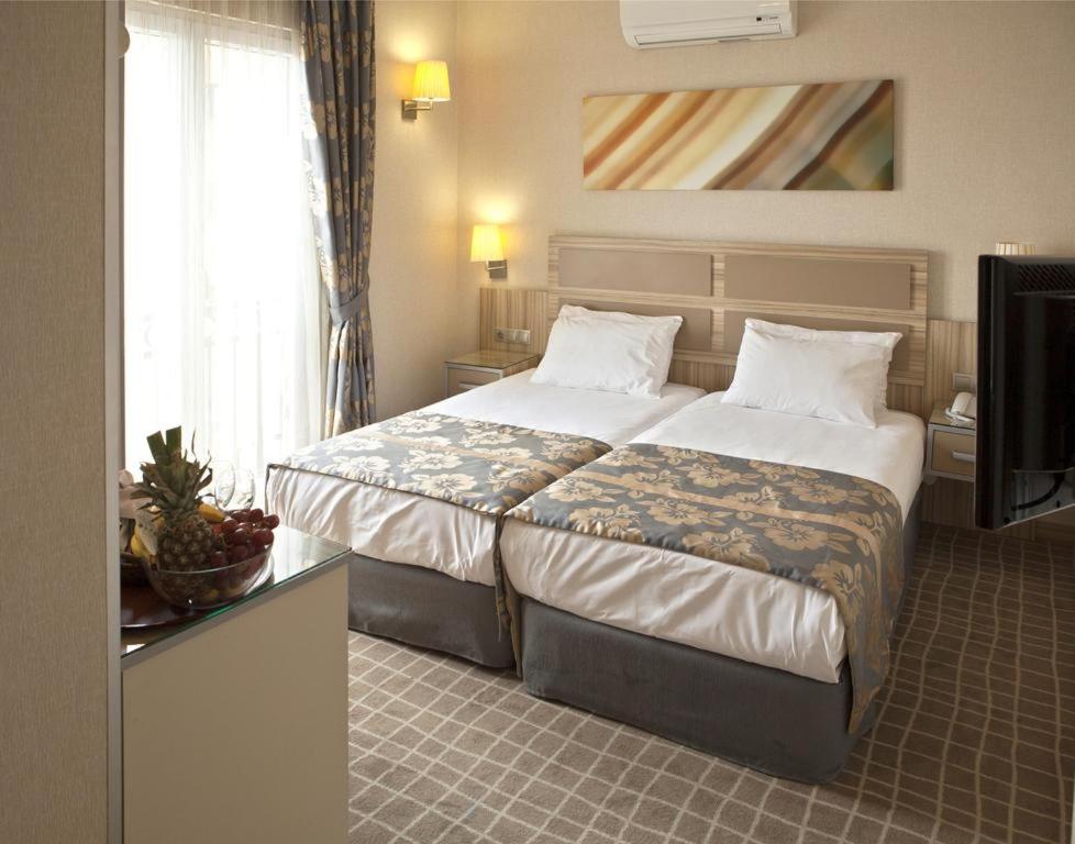 Postel nebo postele na pokoji v ubytování Hotel Vikrant