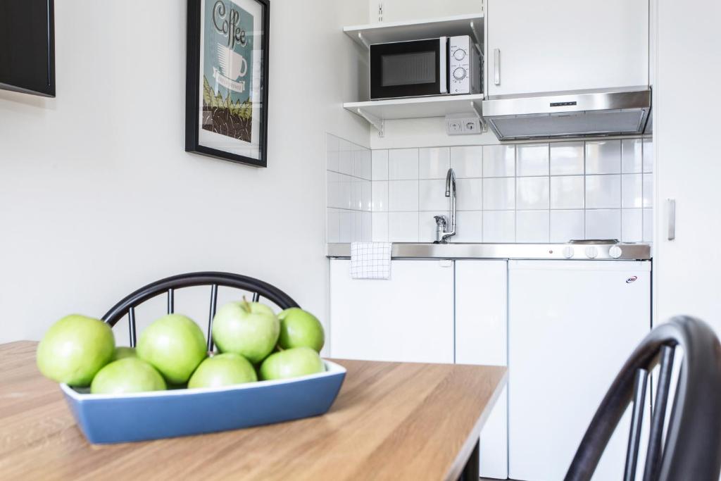 Kuchyň nebo kuchyňský kout v ubytování Biz Apartment Solna