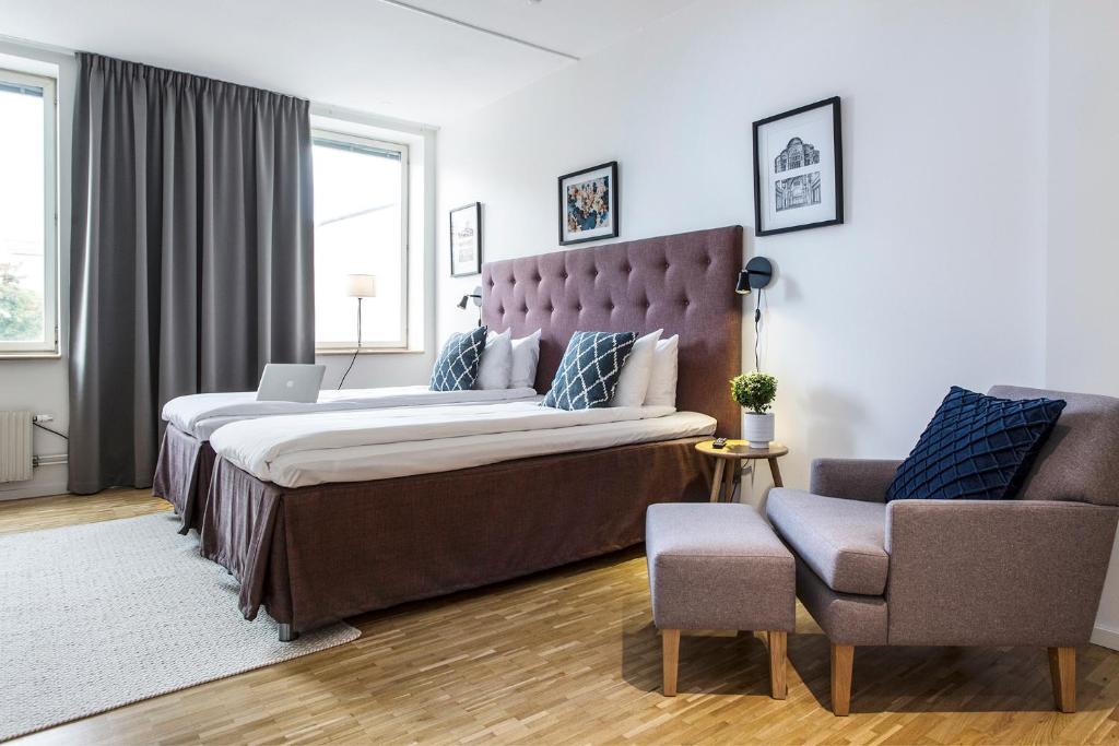 Postel nebo postele na pokoji v ubytování Biz Apartment Solna