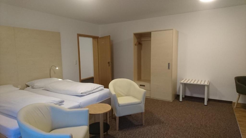 Postel nebo postele na pokoji v ubytování Gästehaus Langhammer