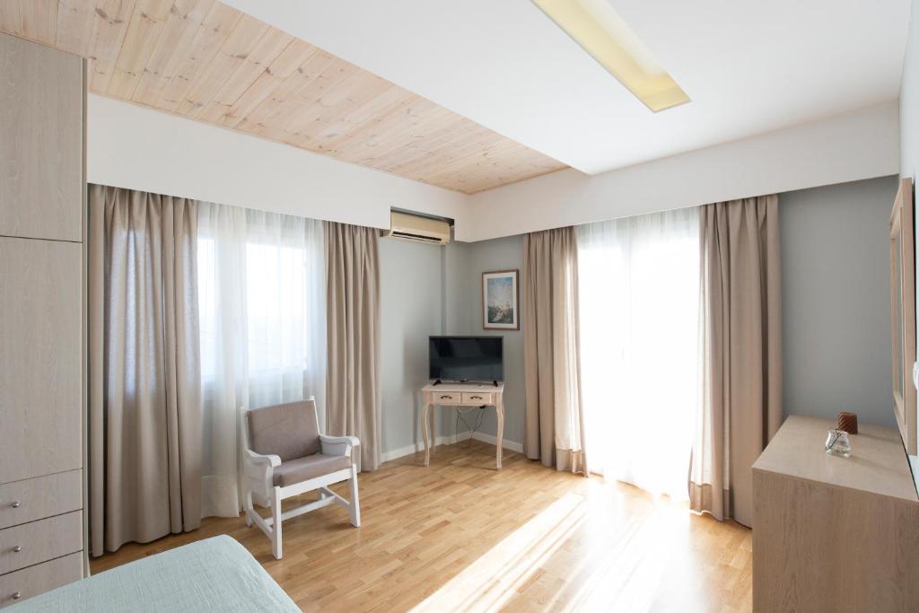 Televízia a/alebo spoločenská miestnosť v ubytovaní Virginia Seaside Villas