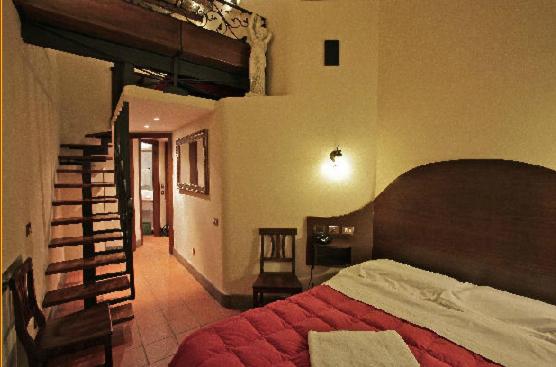 Postel nebo postele na pokoji v ubytování Hotel Panda