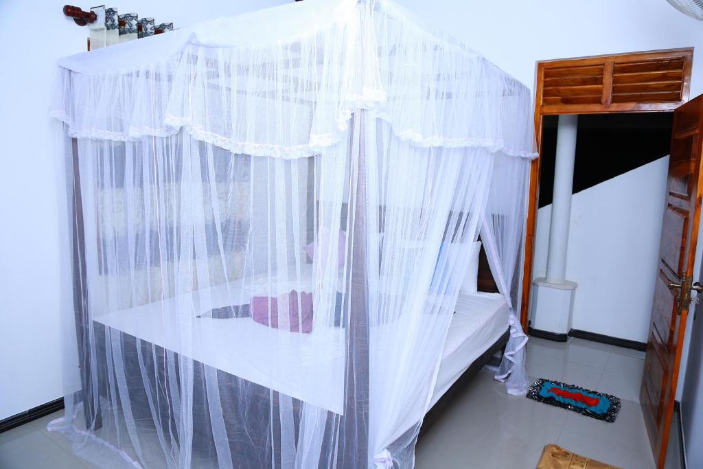 Postel nebo postele na pokoji v ubytování Seaside House
