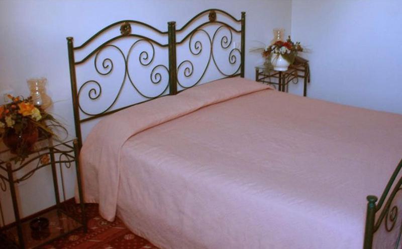 Postel nebo postele na pokoji v ubytování Hotel Parco Dei Principi