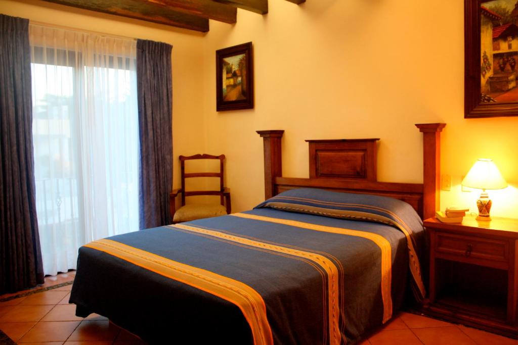 Postel nebo postele na pokoji v ubytování Hotel Lunata - 5th Avenue