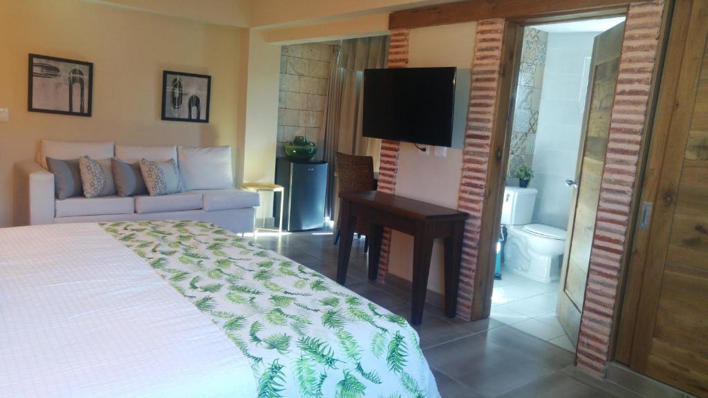 Postel nebo postele na pokoji v ubytování MON Hotel Boutique