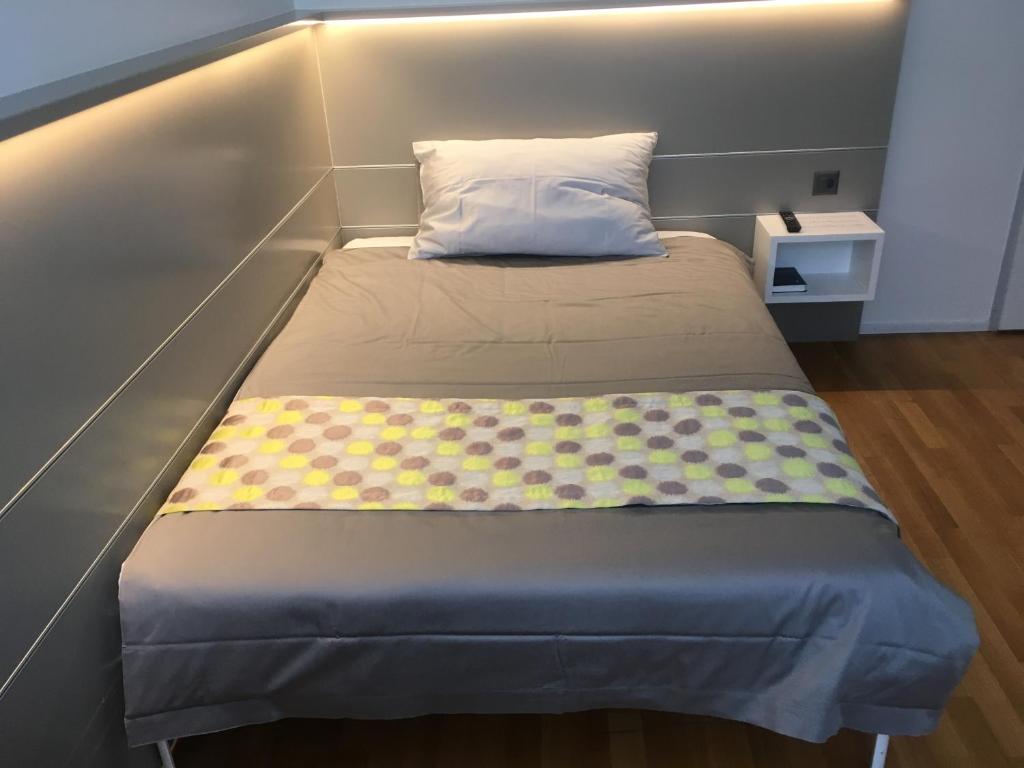 
Ein Bett oder Betten in einem Zimmer der Unterkunft Hotel Flawil
