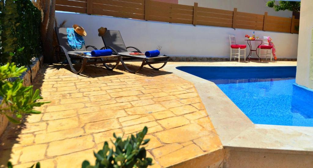 The swimming pool at or close to Casa Nerium