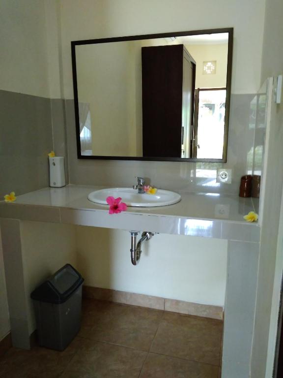 Koupelna v ubytování Kartika Bungalows
