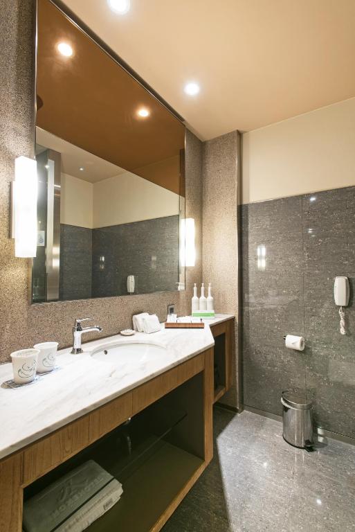 Koupelna v ubytování Home Hotel