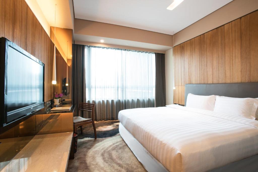 Postel nebo postele na pokoji v ubytování Home Hotel