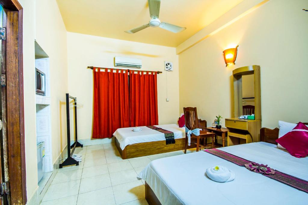 Postel nebo postele na pokoji v ubytování Bou Savy Guesthouse