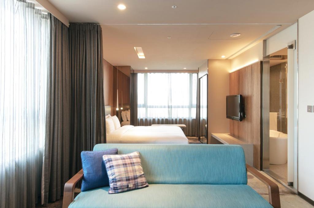Postel nebo postele na pokoji v ubytování Home Hotel