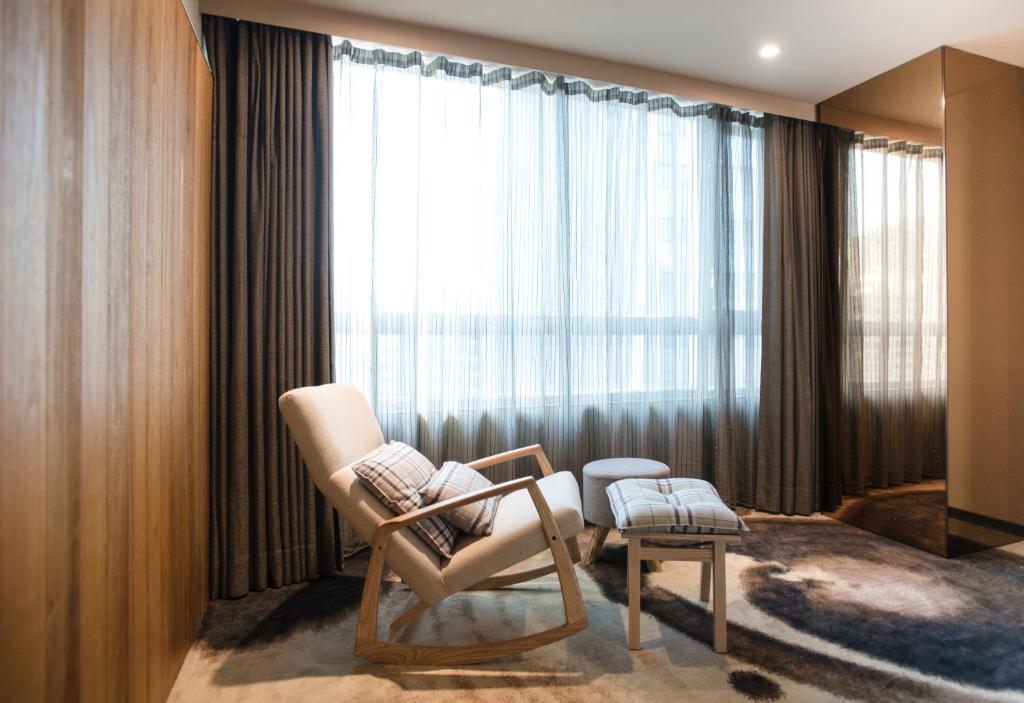 Posezení v ubytování Home Hotel