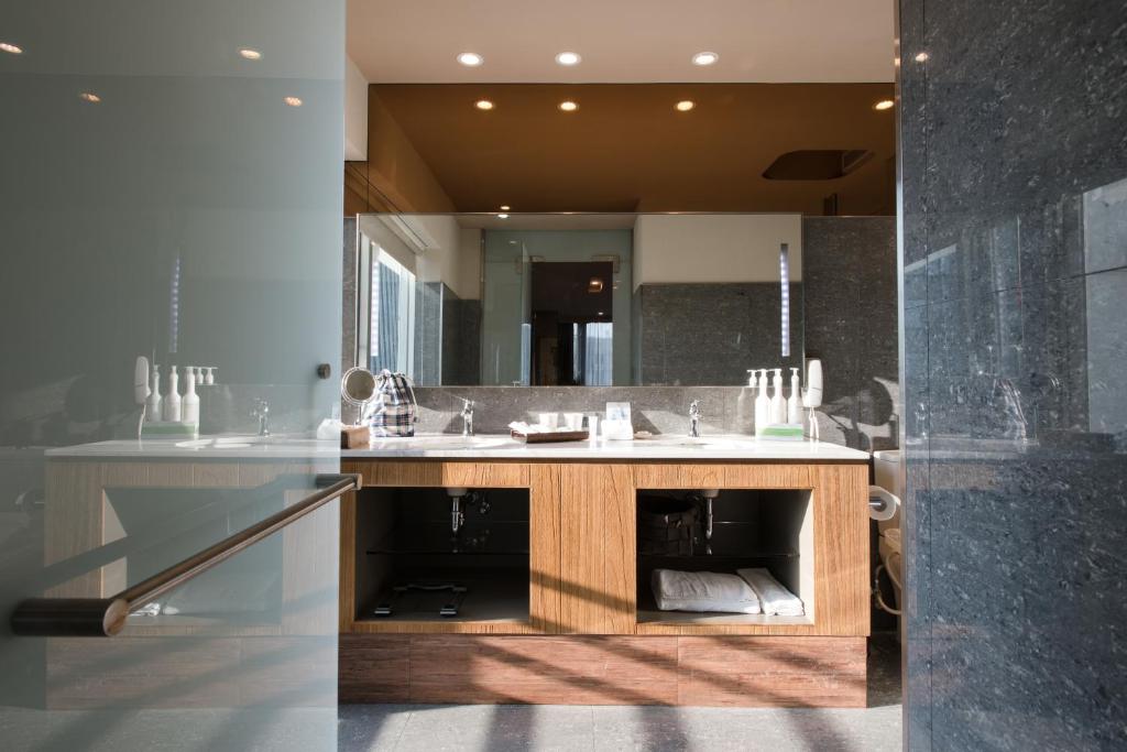 Kuchyň nebo kuchyňský kout v ubytování Home Hotel