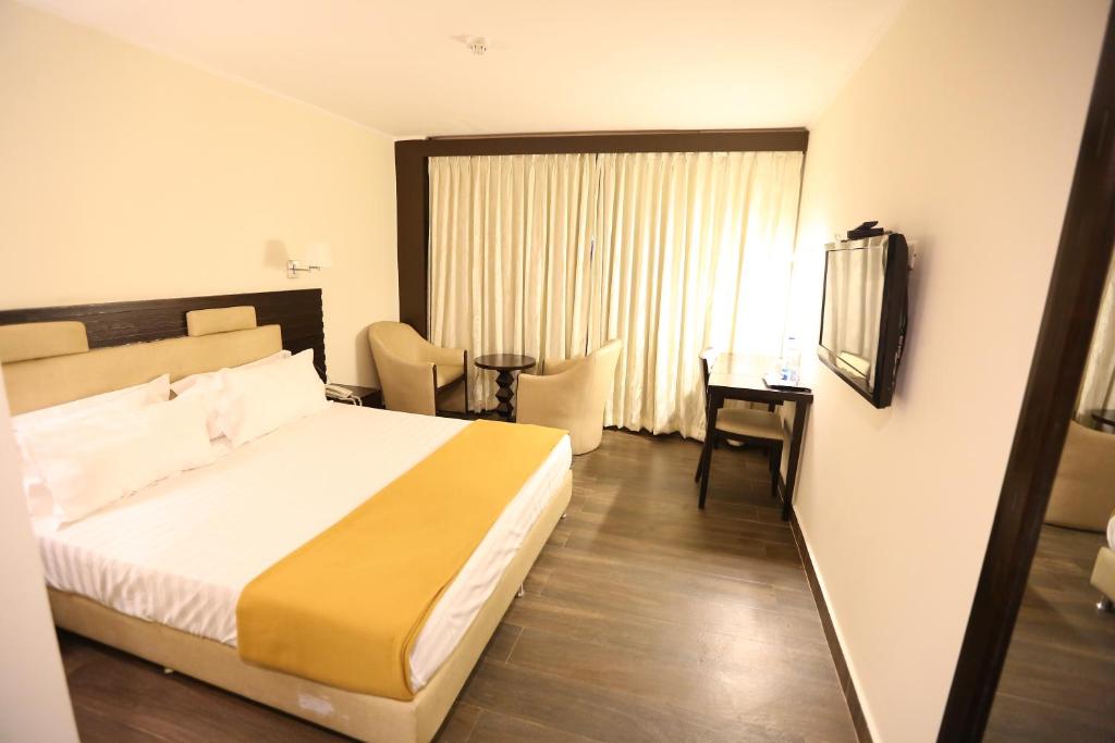 Postel nebo postele na pokoji v ubytování Hotel La Castle