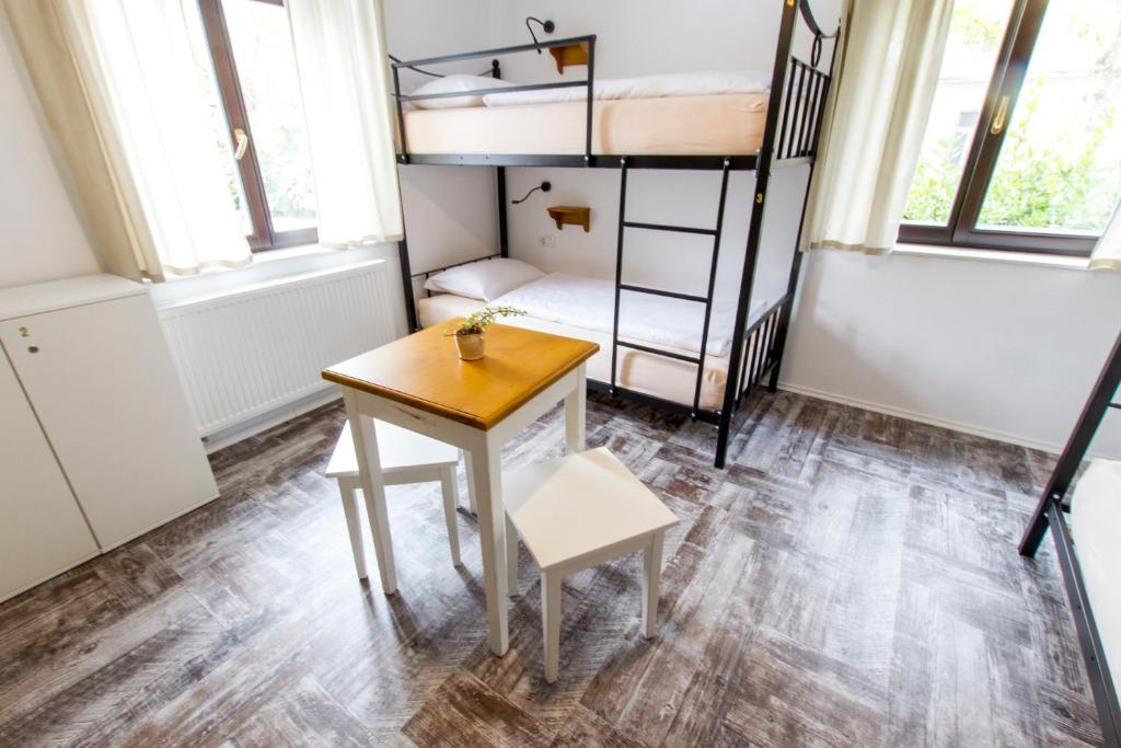 Postel nebo postele na pokoji v ubytování Hostel Hildegarden