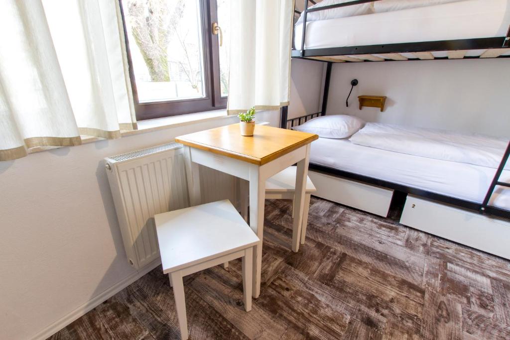 Postel nebo postele na pokoji v ubytování Hostel Hildegarden