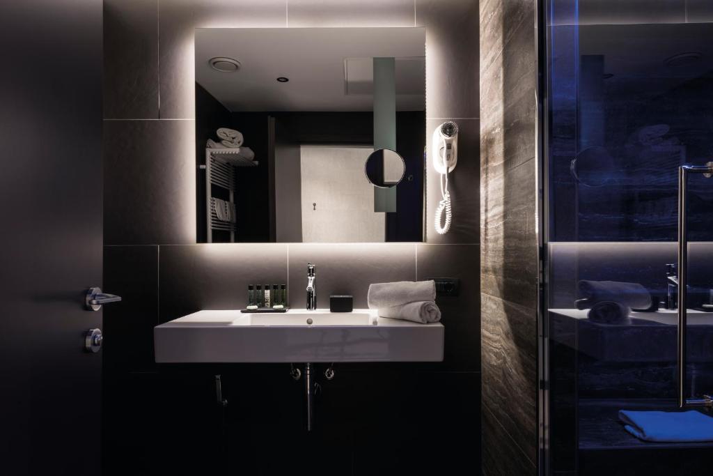 Ванна кімната в Hotel Manin