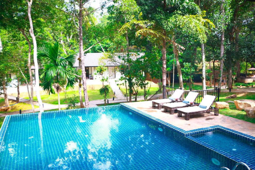 Bazén v ubytování Serendib Signature Resort nebo v jeho okolí