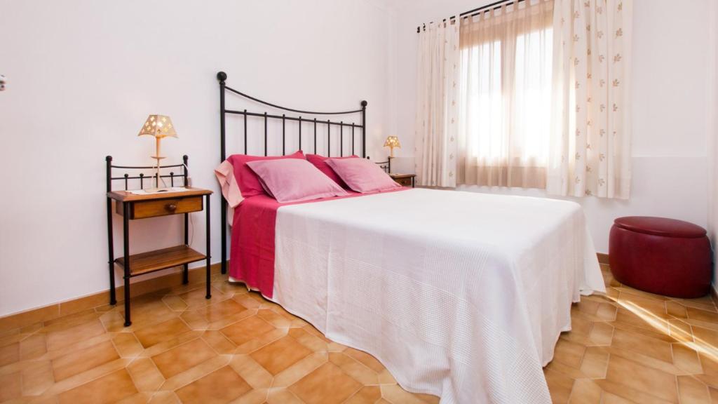 Postel nebo postele na pokoji v ubytování Casa CORA Alcudia by Mallorca Villa Selection